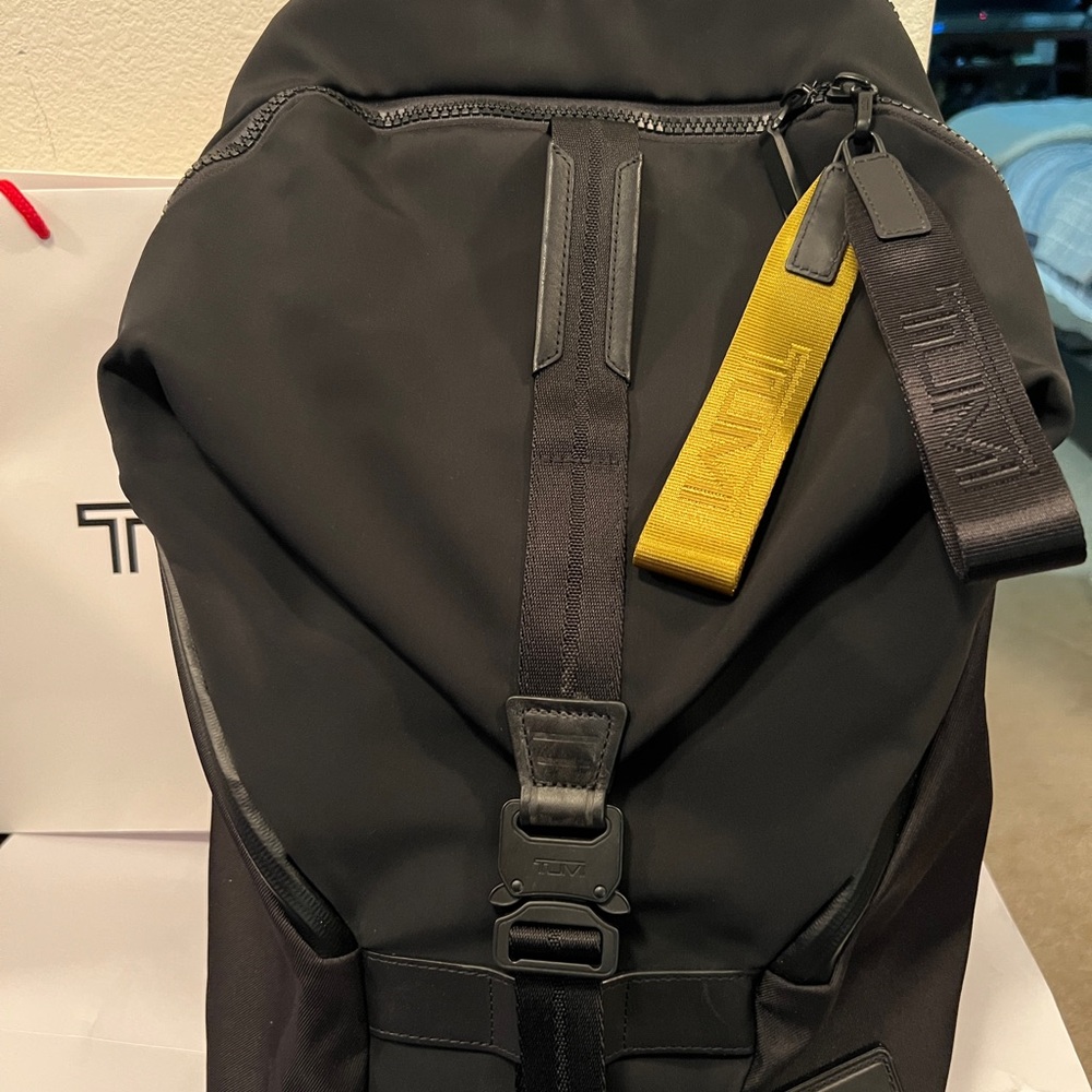 Tumi Black Backpack with Yellow Accent